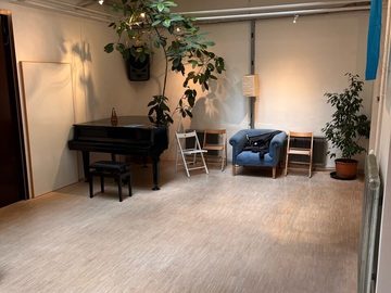 A seminar room with grand piano